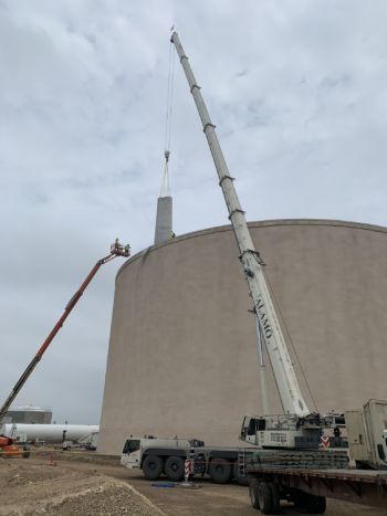 Stand pipe being removed from 12 MG tank-San Antonio Texas